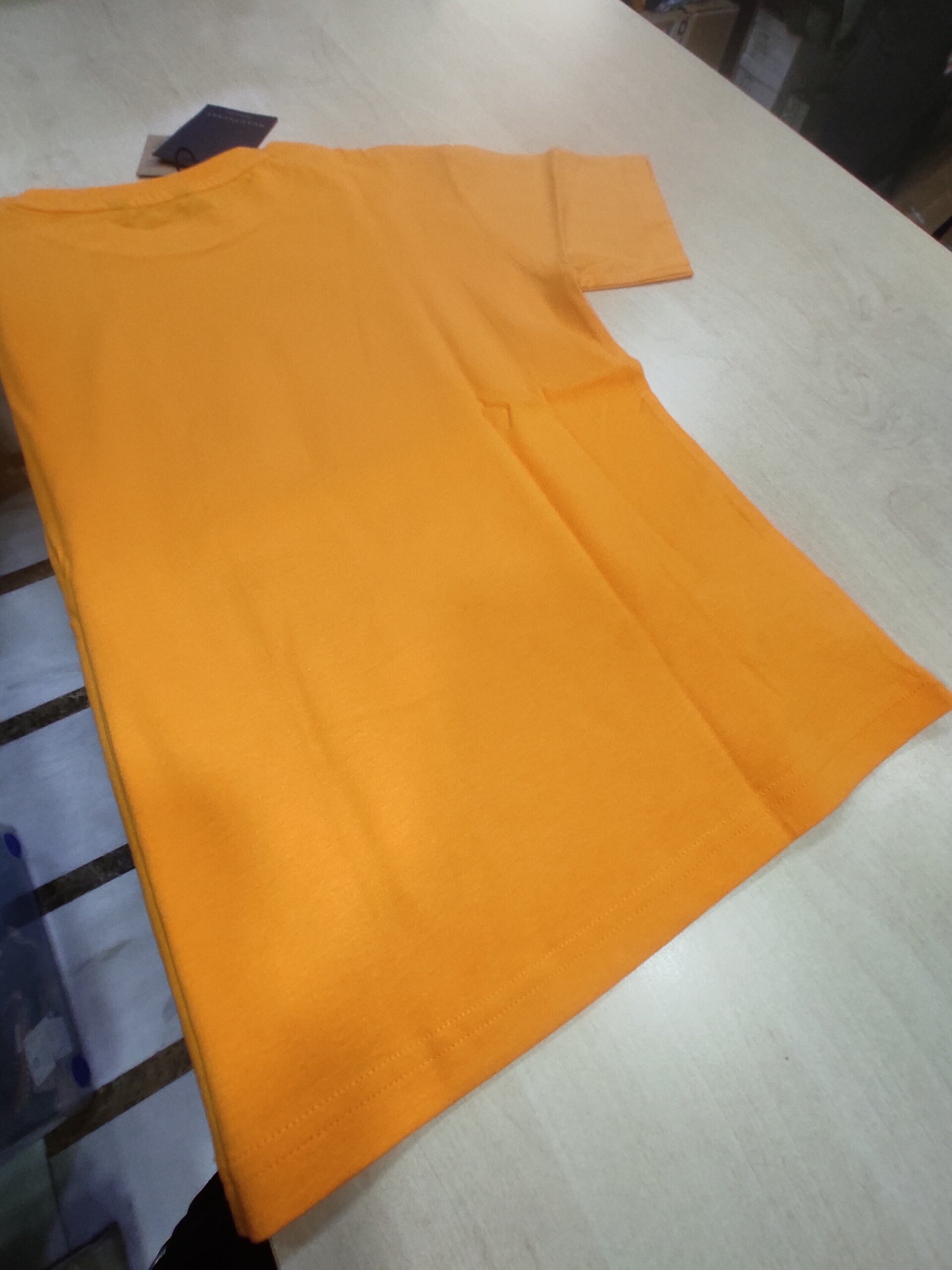 Camiseta naranja 10 años - 6